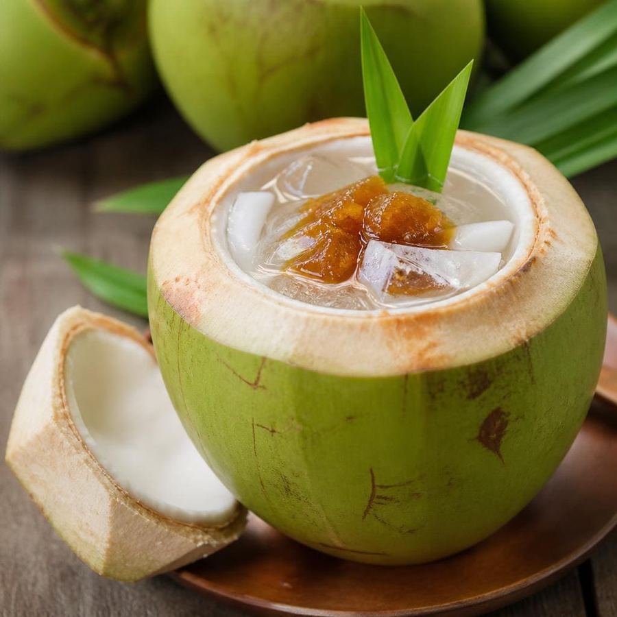 Foto Es Kelapa Es Teler 77 dengan kelapa muda es dan gula kelapa